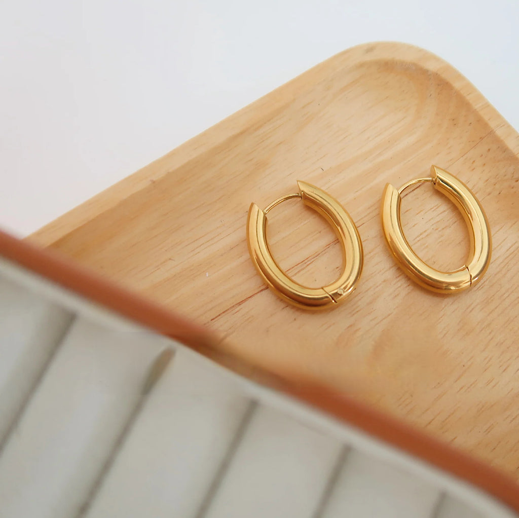 Minimalist gold oval ear clips titanium steel jewelry details