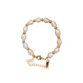 Natural baroque freshwater pearl bracelet with 18K gold vacuum plated titanium steel chain
