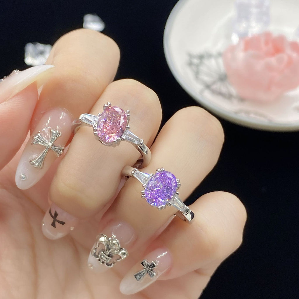 Luxury ice-flower cut zircon open rings in pink and purple colorways displayed on fingers